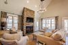 foothills cottage plan vaulted living room stone fireplace
