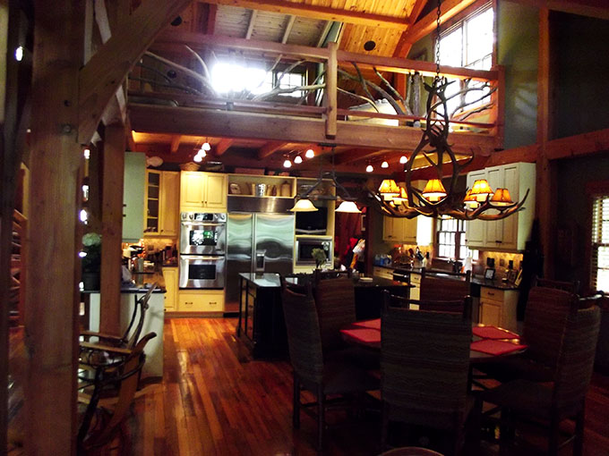 Kitchen inside a completed Camp Stone timber frame house