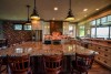 asheville-lake-home-open-brick-walled-kitchen-craftsman