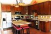 l-shaped-kitchen-with-island-hardwood-floors
