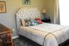 guestroom-bed-with-bird-pillows