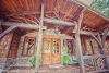rustic-front-porch-with-timber-frame-antler-details