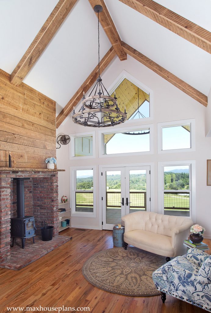 Banner Elk, Built: How Porch, Loft and Grade Shape the Home Vaulted Banner Elk living room with exposed beams and porch doors